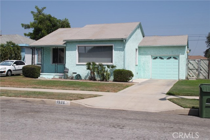 Residential Home in Compton S of Rosecrans, E of Central,W of Ala