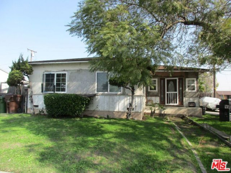 Residential Home in Compton S of Rosecrans, E of Central,W of Ala