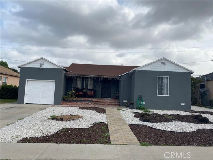 Residential Home in Compton S of Rosecrans, E of Central,W of Ala