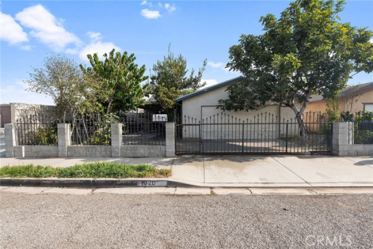 Residential Home in Compton S of Rosecrans, E of Central,W of Ala