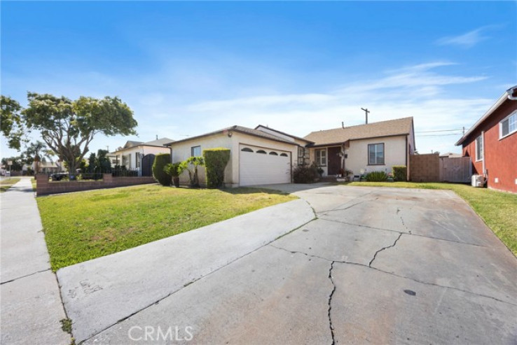 Residential Home in Compton S of Rosecrans, E of Central,W of Ala