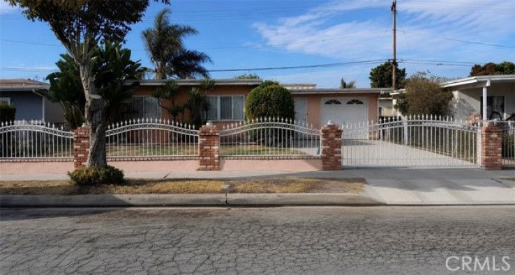 Residential Home in Compton S of Rosecrans, E of Central,W of Ala